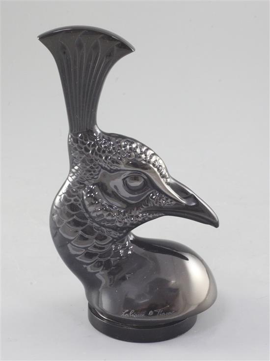 Tête de Paon/Peacocks head. A glass mascot by René Lalique, introduced on 3/2/1928, No.11876 Height 17.4cm.